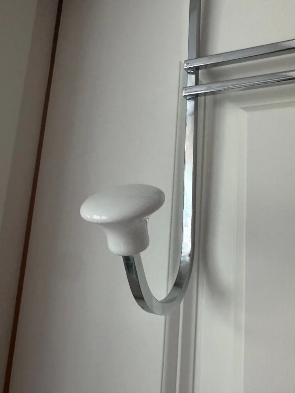 Container Store: Chrome 5-Hook Over-the-Door Rack with White Ceramic Knobs